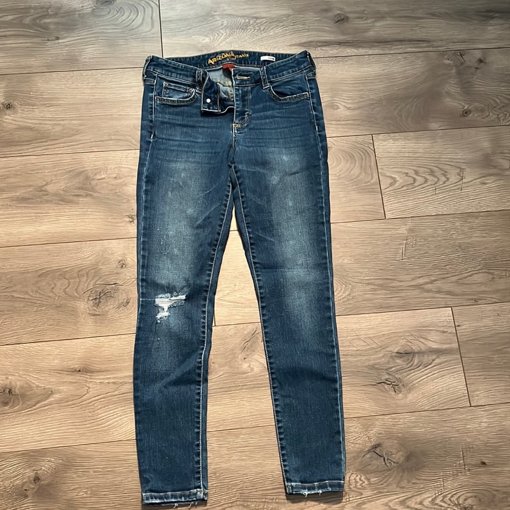 Ripped dark blue jeans. Size 7.